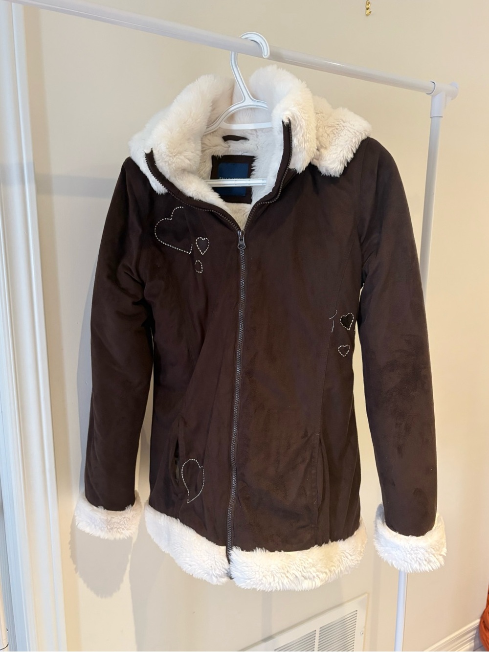 Brown jacket with white fur trim